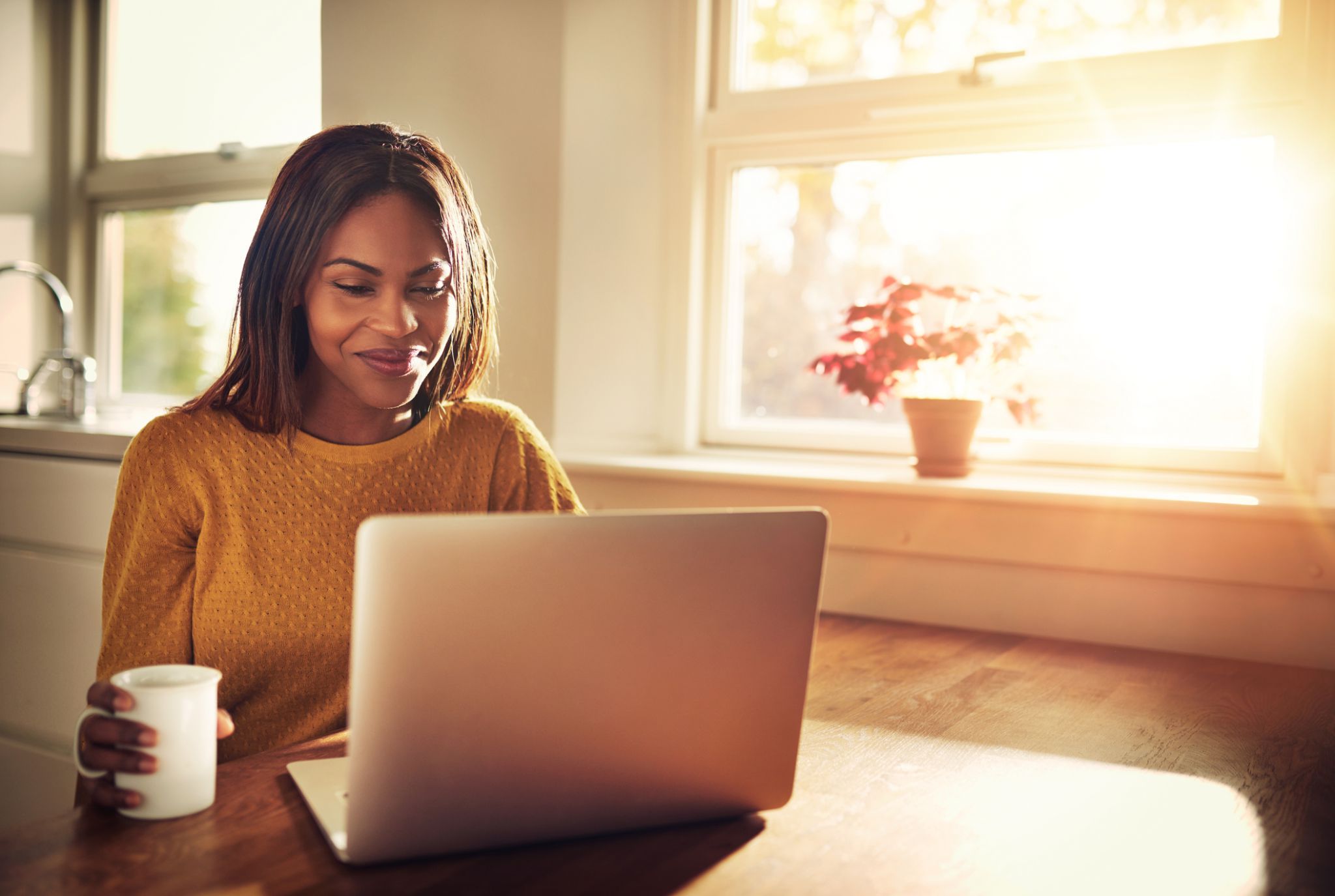 woman smiling during online therapy session