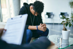 young man sat in EMDR therapy norwich