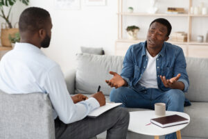 man in culturally sensitive therapy session with psychologist